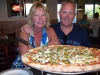That's a big pizza!!!!!  Jenny Kirwan (me) and Steve at East Coast Pizza, Florida